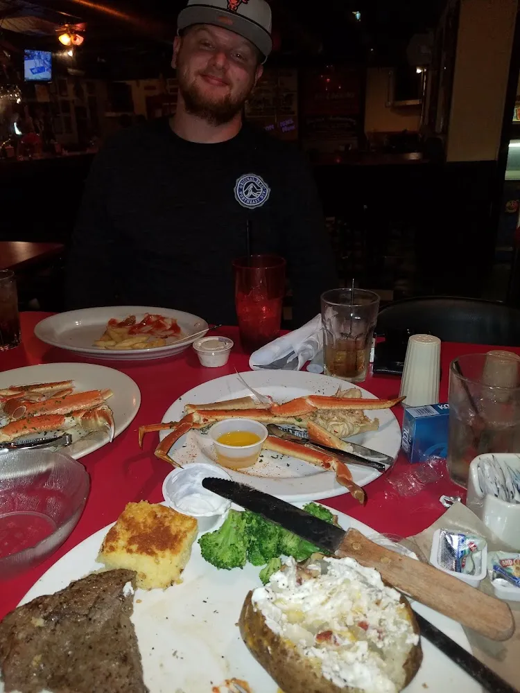 Ribe Eye and Snow Crab Legs